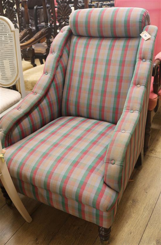 A tartan upholstered armchair